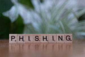 Picture of scrabble tiles spelling out "phishing".